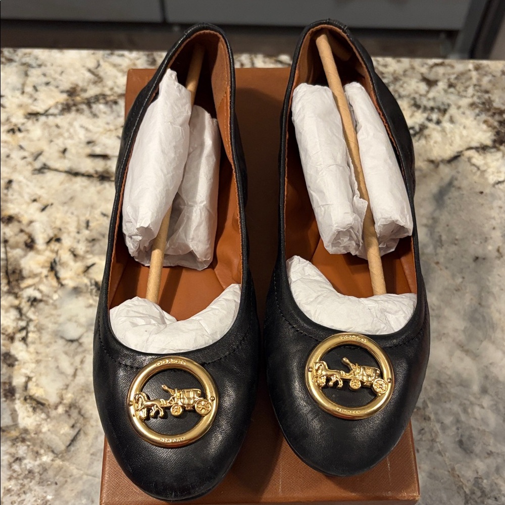 Coach Black Leather Ballet Flats with Gold Medallion logo